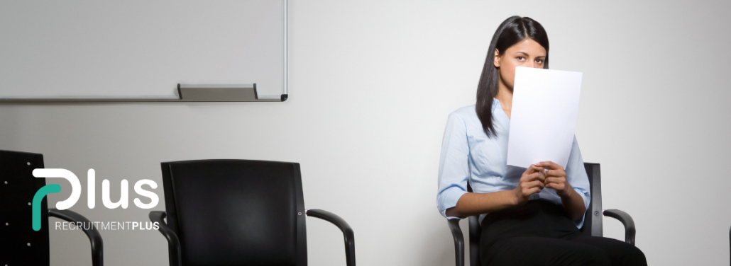 Conquering Second Round Interview Jitters woman sits in a chair nervously awaiting a job interview